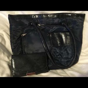 Small to medium blue Avon bag with wallet.
